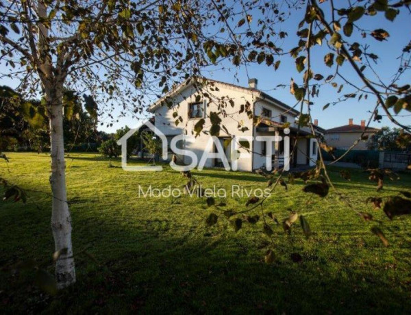 UN VERDADERO HOGAR ES ESTA CASA A POCOS KILOMETROS DE SANTIAGO DE COMPOSTELA.